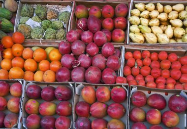 Ripe fresh fruit at a street bin. Eastern market, Hurghada, Egypt, Africa clipart