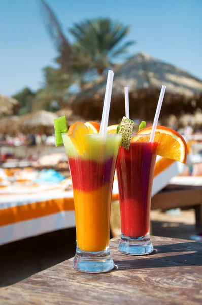 stock image Cocktails from fresh fruit in a tall glass with tubes