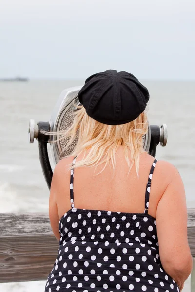 stock image Woman Looking Through Coin Operated Binoculars