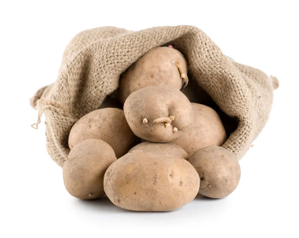 Rohe Kartoffeln im hessischen Sack isoliert — Stockfoto