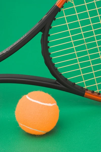 Tennis racket and a ball — Stock Photo, Image