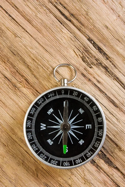 Compass on the background of the wooden planks — Stock Photo, Image