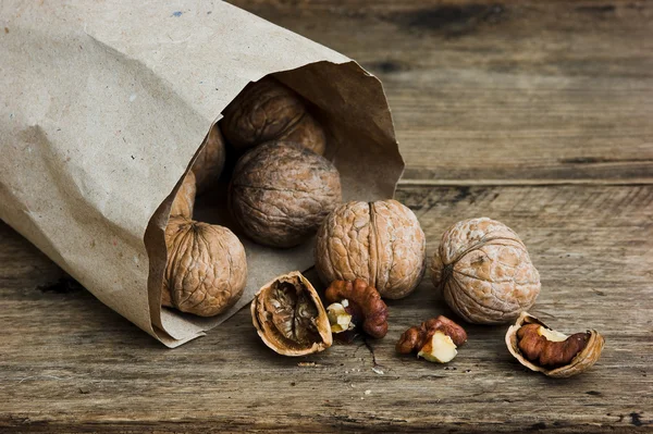 Nuts in paper bags — Stock Photo, Image