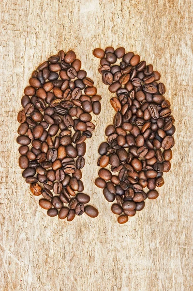 Kaffebönor i styrelsen — Stockfoto