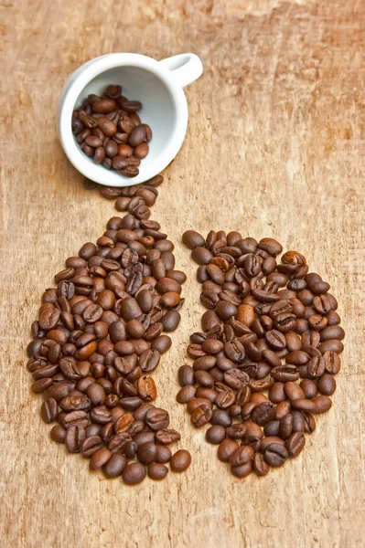 Kaffeebohnen auf dem Brett — Stockfoto