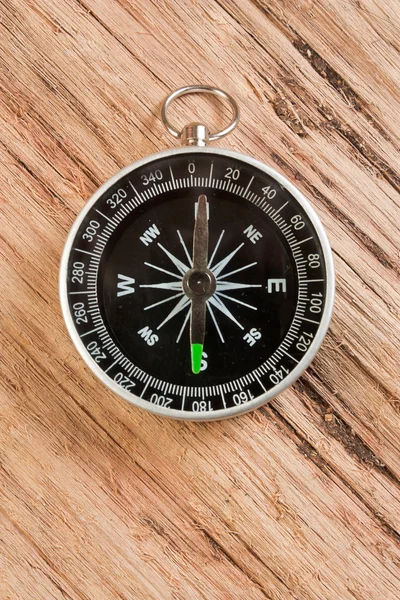 Compass on the background of the wooden planks — Stock Photo, Image
