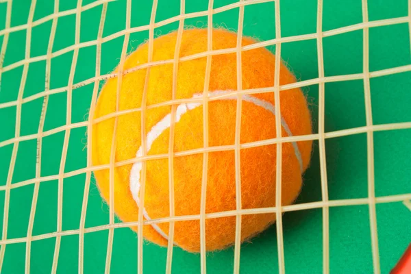 Tennis racket and a ball — Stock Photo, Image