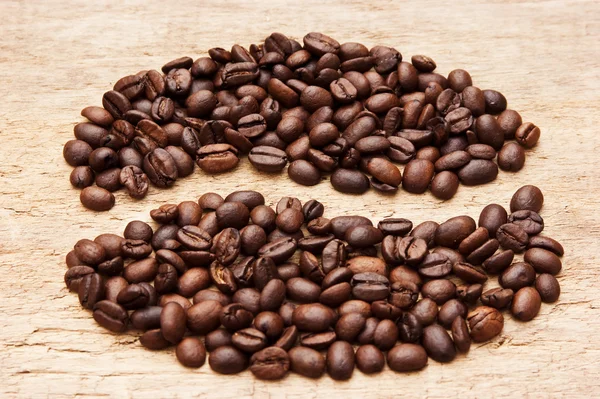 Kaffeebohnen auf dem Brett — Stockfoto