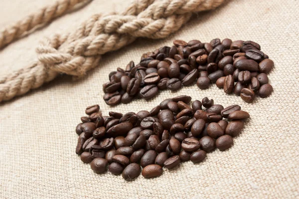 Coffee beans on the board — Stock Photo, Image
