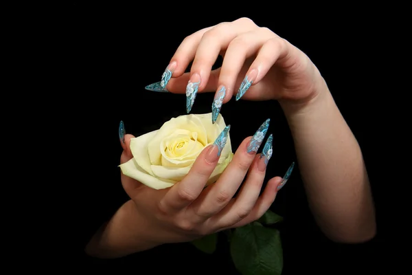 Human fingers with long fingernail and beautiful manicure isolated on black — Stock Photo, Image