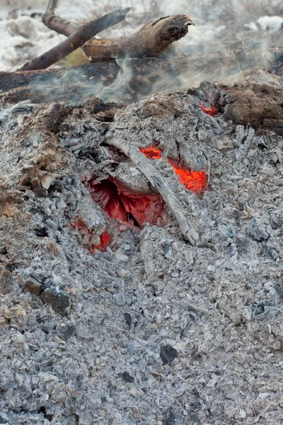 stock image Coals and ashes glowing and smoking