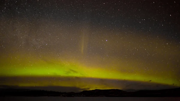Northern lights and myriad of stars — Stock Photo, Image