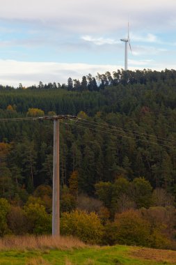 Power line and wind turbine clipart