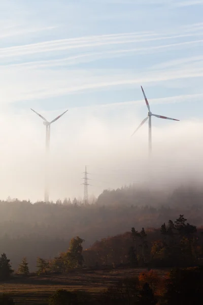 Wind turbines in fog — Stock Photo, Image