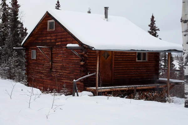 Gezellige winter cabine — Stockfoto