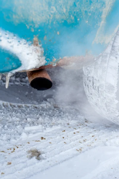 Vehicle exhaust pipe in winter — Stock Photo, Image