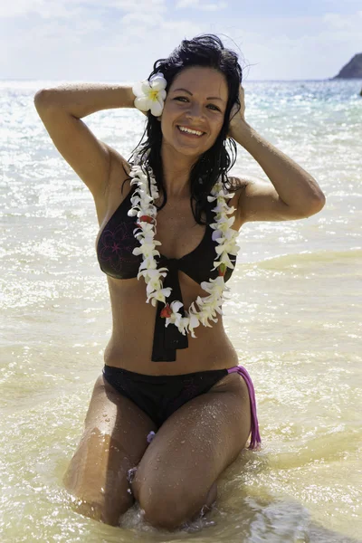 Hispanic woman in bikini at the beach — Stock Photo, Image