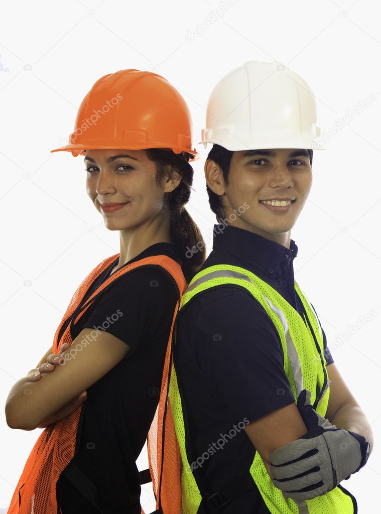 Male and female hardhat workers