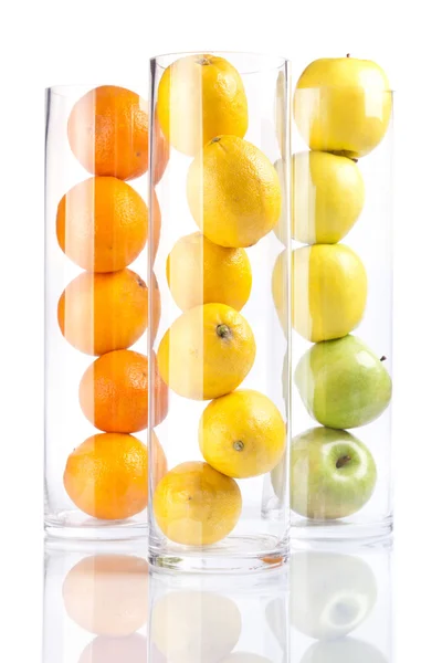 Группа фруктов: апельсины, лимоны, яблоки — стоковое фото