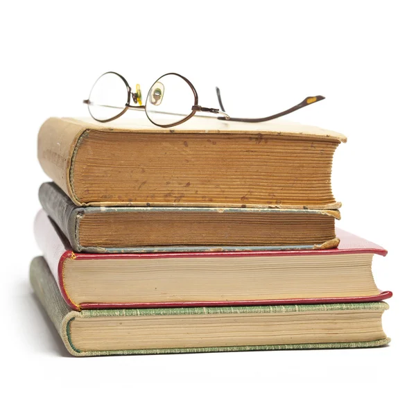 Grupa starych książek i okulary — Zdjęcie stockowe
