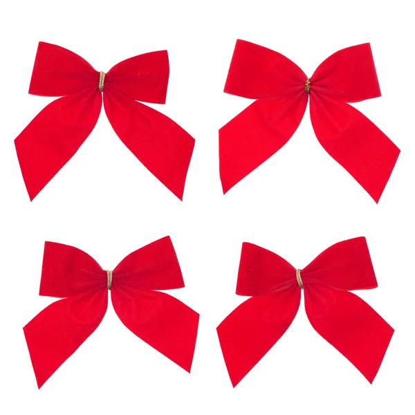 Cztery prezent czerwoną wstążką i łuk — Zdjęcie stockowe