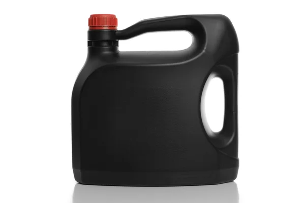 Schwarze Plastikflasche rote Kappe — Stockfoto