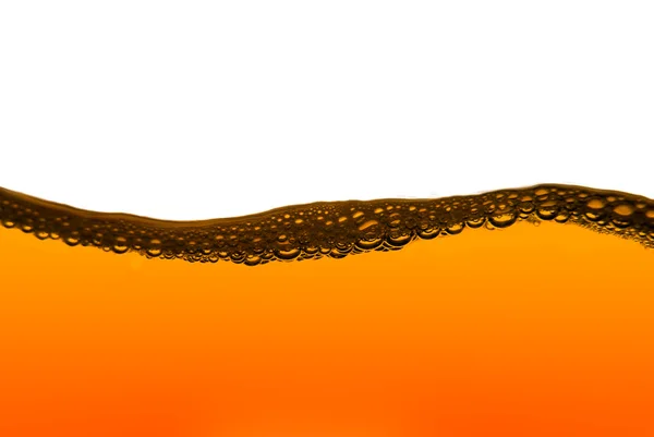 Orange fuel line with bubbles — Stock Photo, Image