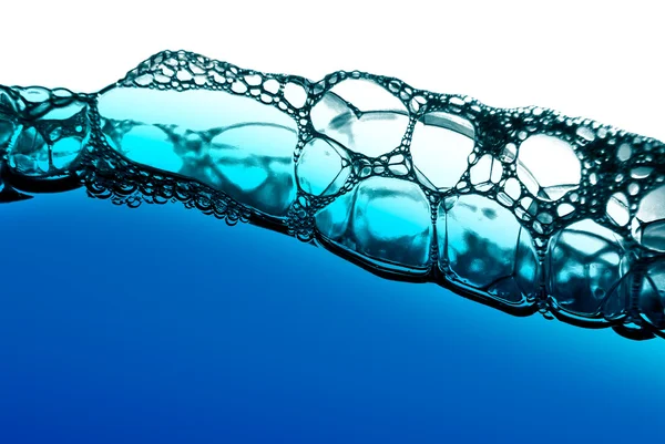 Vzduchové bubliny v modré vodě — ストック写真