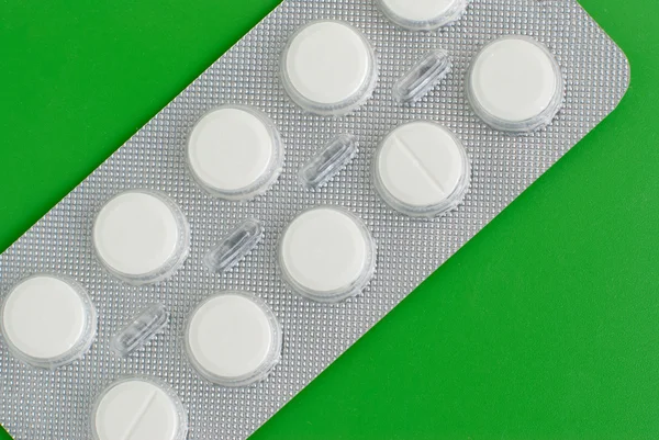 Makro zobrazení bílé pilulky — Stock fotografie