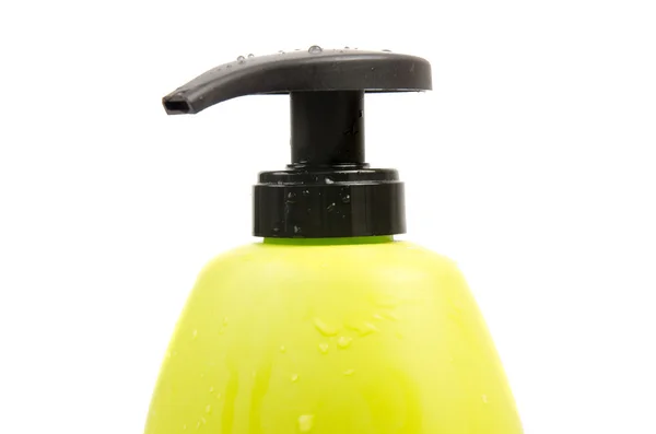 Gros plan de bouchon de bouteille de shampooing vert — Photo