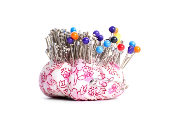 Colored pinheads in pin-cushion — Zdjęcie stockowe