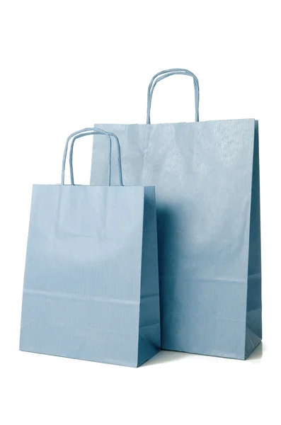 Sacos de papel de compras azuis — Fotografia de Stock