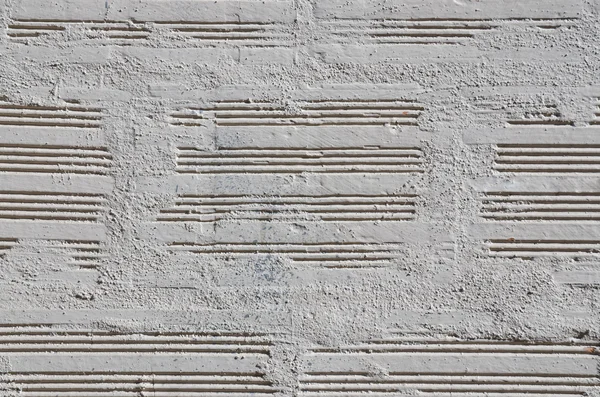 Bakstenen muur geschilderd met een witte verf — Stockfoto