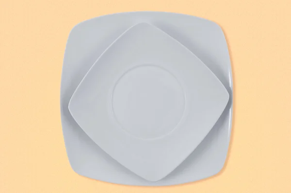 Square white plates — Stock Photo, Image