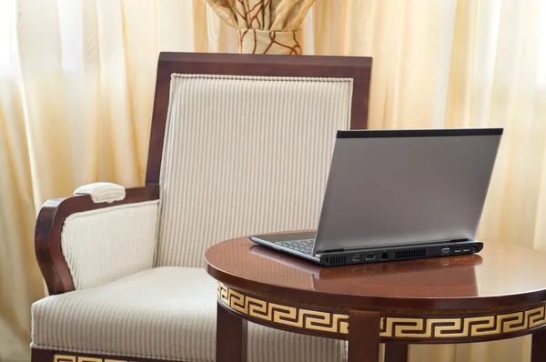 Notebook (laptop) on a home interior — Stock Photo, Image