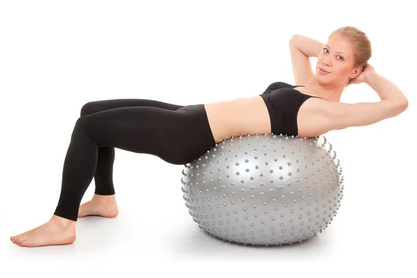 Athletic girl with a silver ball — Stock Photo, Image