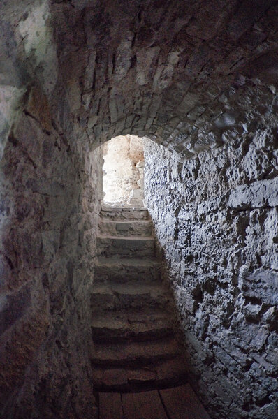 Stone corridors in the ruins of an ancient castle