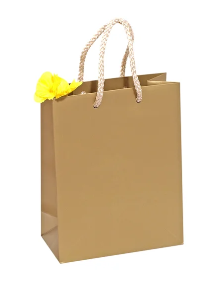 Birthday gift bag with yellow flower. — Stock Photo, Image