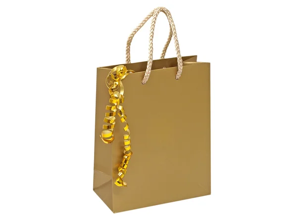Gift bag with decorative golden tape. — Stock Photo, Image
