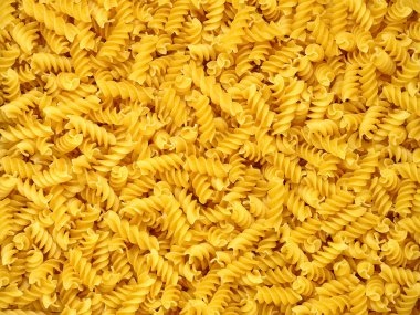 Dry pasta spirales. clipart