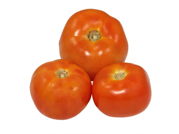 Três tomatos.Isolado . — Fotografia de Stock