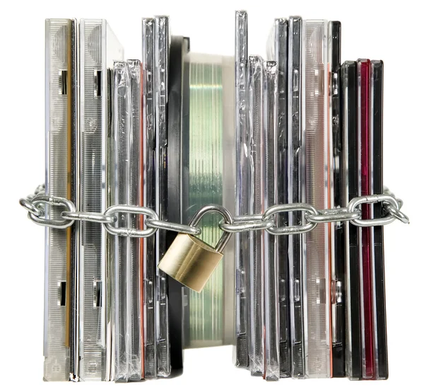 Compact discs are secured with lock — Stock Photo, Image