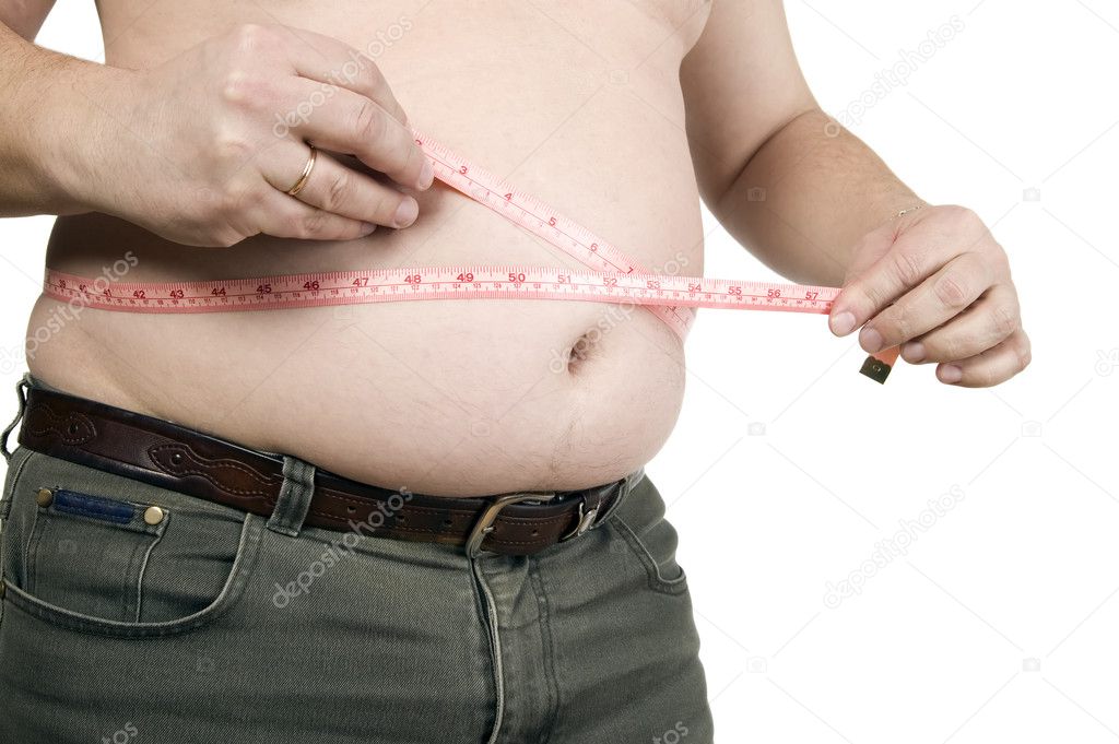 Man is measuring his belly