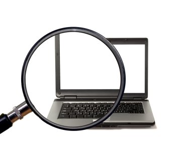 Magnifying glass magnifies laptop clipart