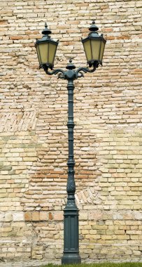 Metal old style lamp for street lighting clipart