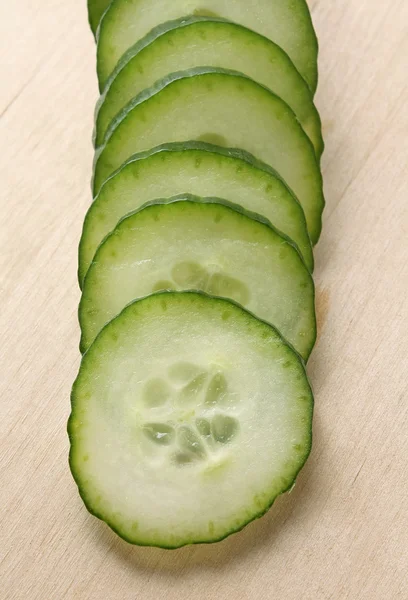 Cucumber on a wooden board — Stock Photo, Image