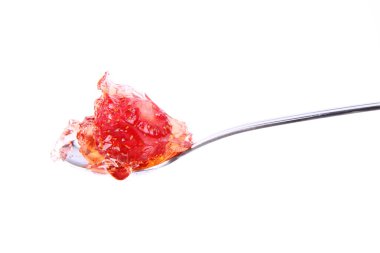 Strawberry jelly on a spoon