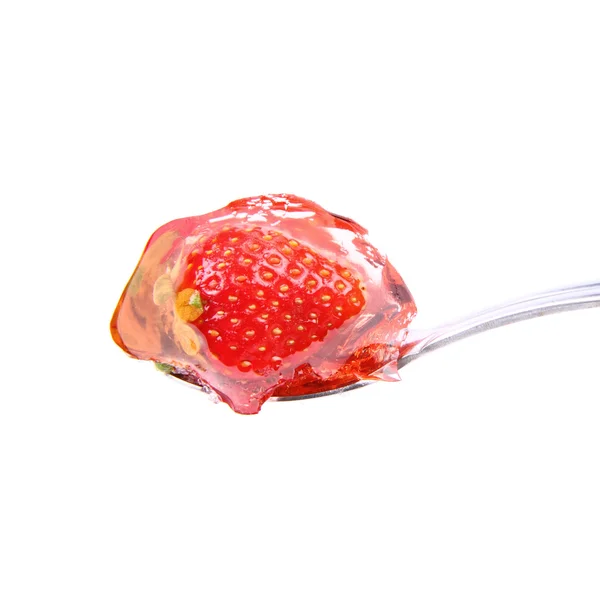 Strawberry jelly on a spoon — Stock Photo, Image