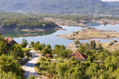 Village and Slano lake in Montenegro, Niksic clipart