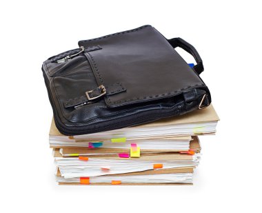 Leather portfolio lying on account books clipart